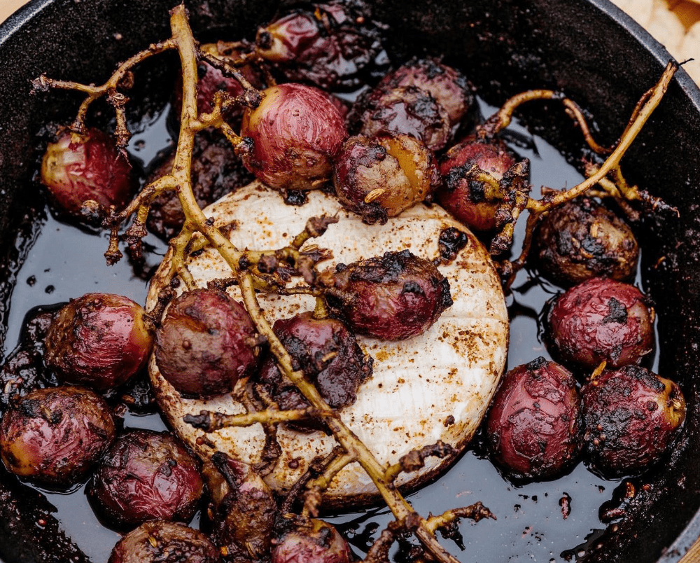 Baked Brie & Grape Chutney made on a Breeo fire pit