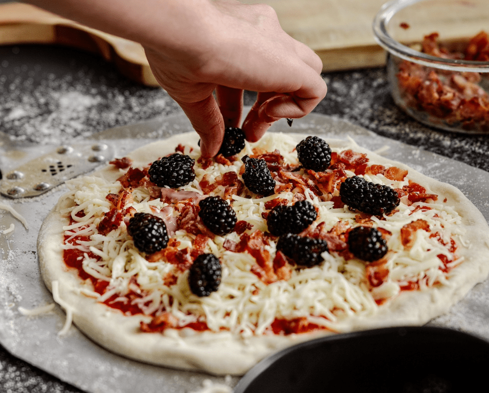 Blackberry Bacon Pizza cooked on a Breeo Pizza Oven