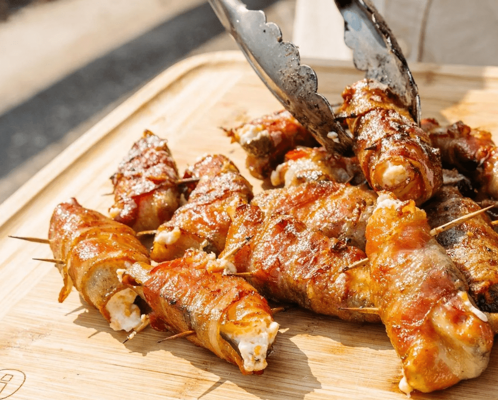 An image of grilled Jalapeno Poppers cooked on the Outpost Grill