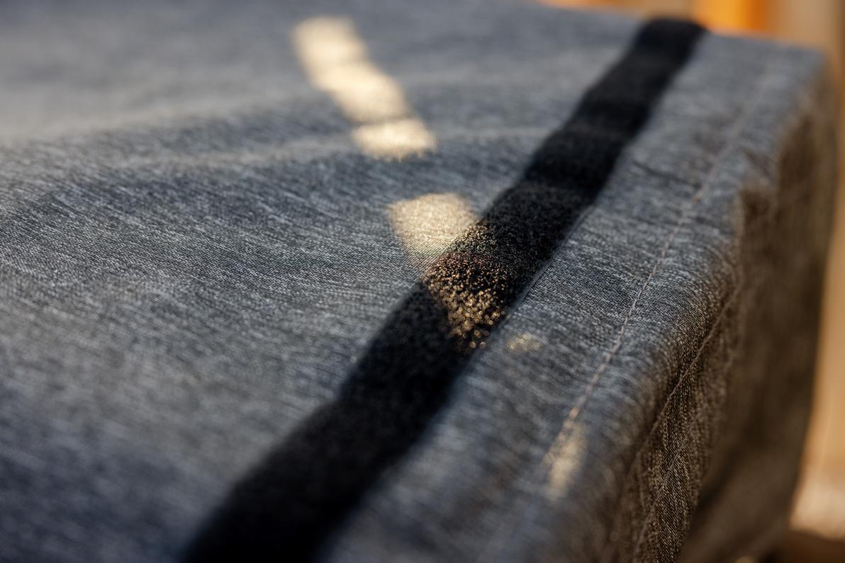 A closeup of the fabric on the firewood rack cover.
