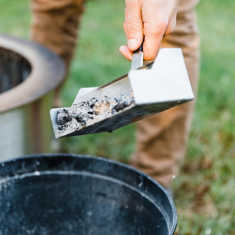 Removing ash with a Breeo Ash Shovel