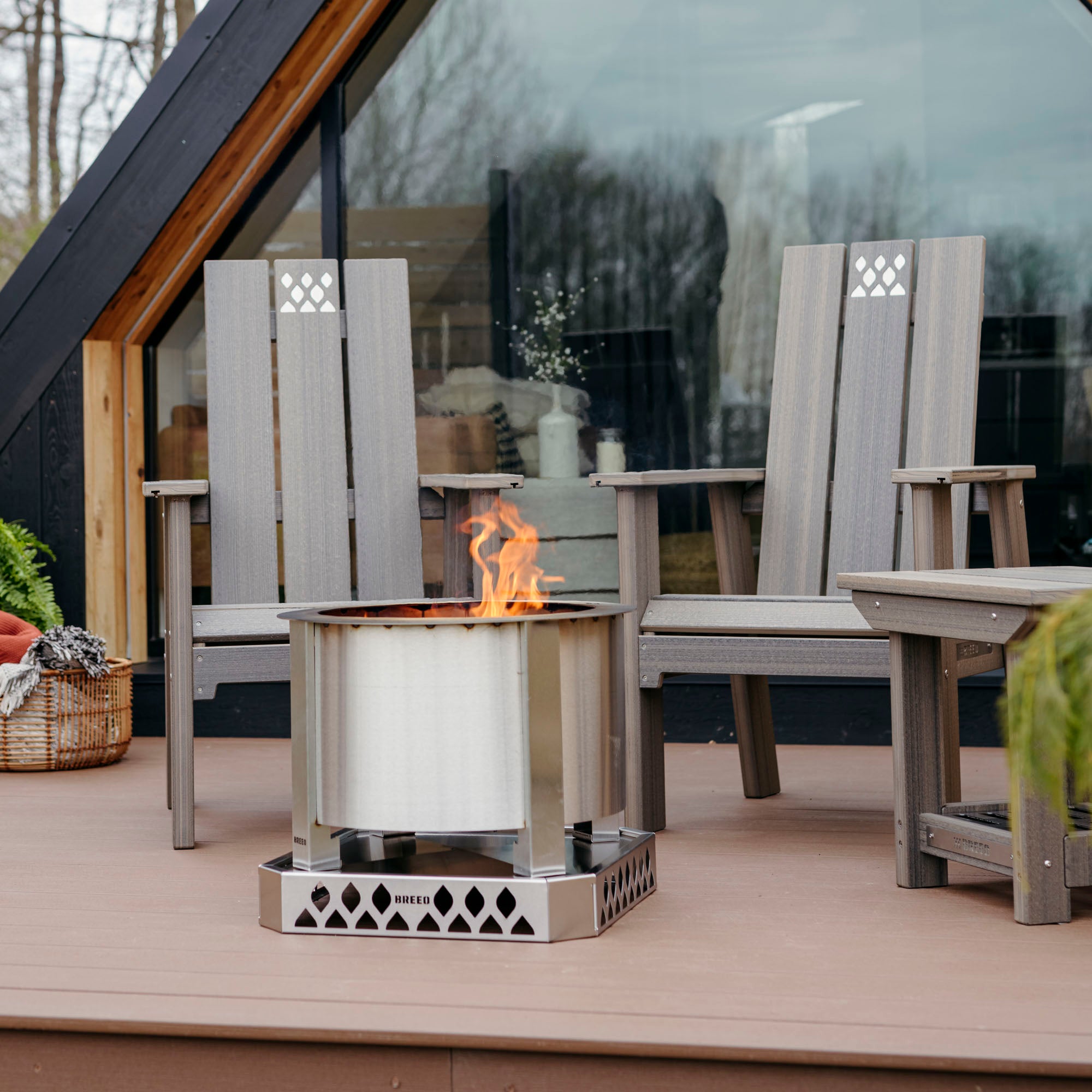 Coastal Gray Breeo chairs, side table, and smokeless firepit