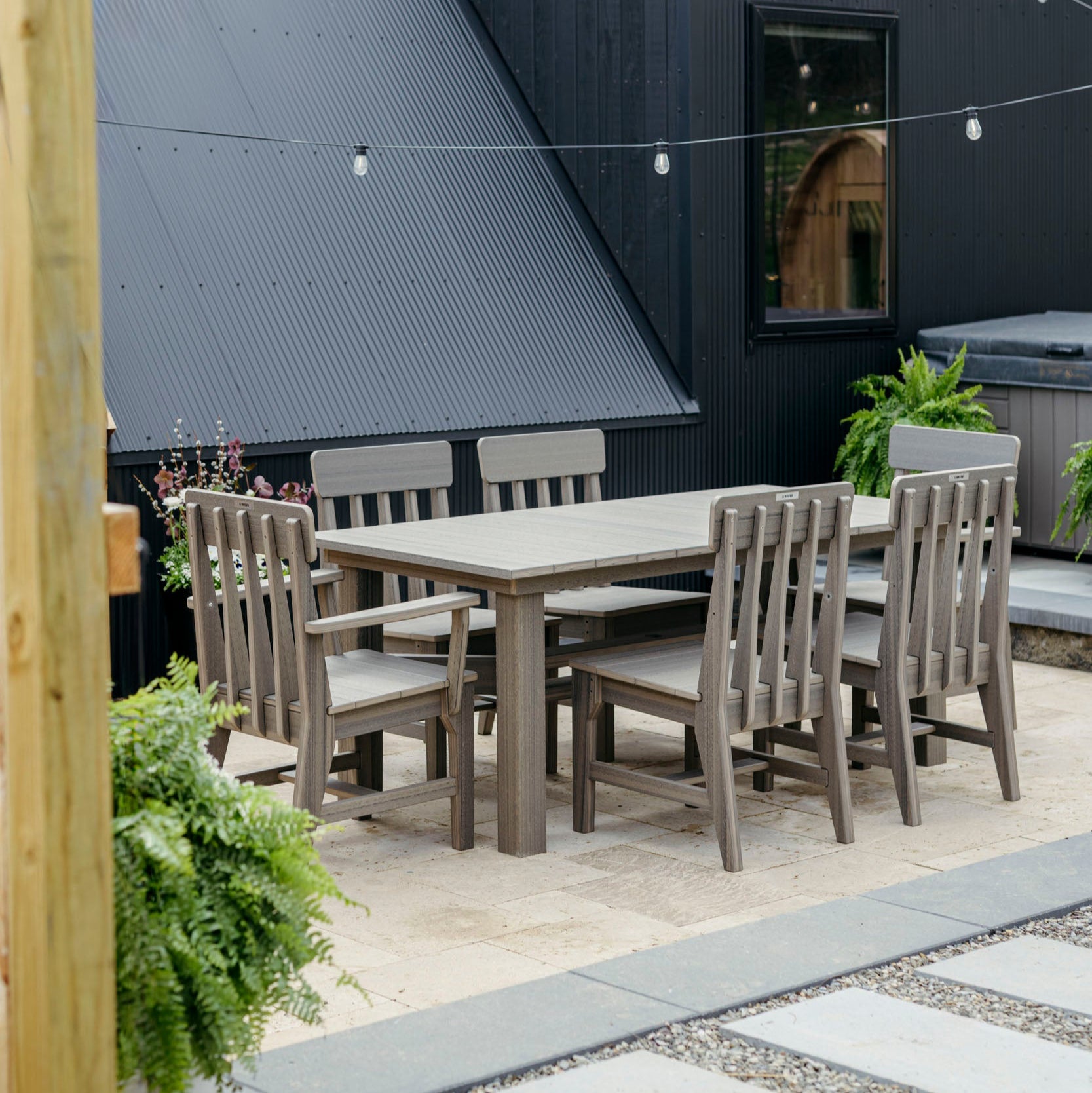 Coastal Gray Breeo 7 piece dining set outside on patio