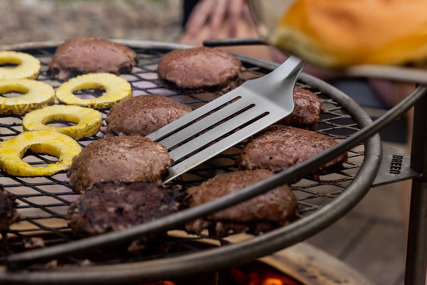 A Breeo Spatula used to flip burgers