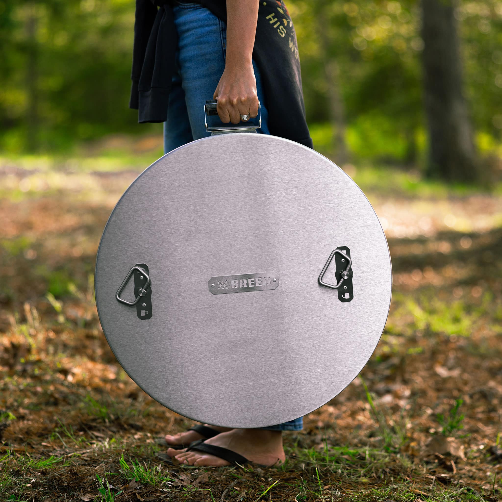 This is a photo of the Y Series firepit with lid and carrying handle