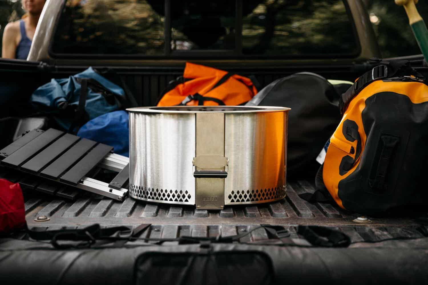 This is an image of the Y Series fire pit in the back of the pickup truck.