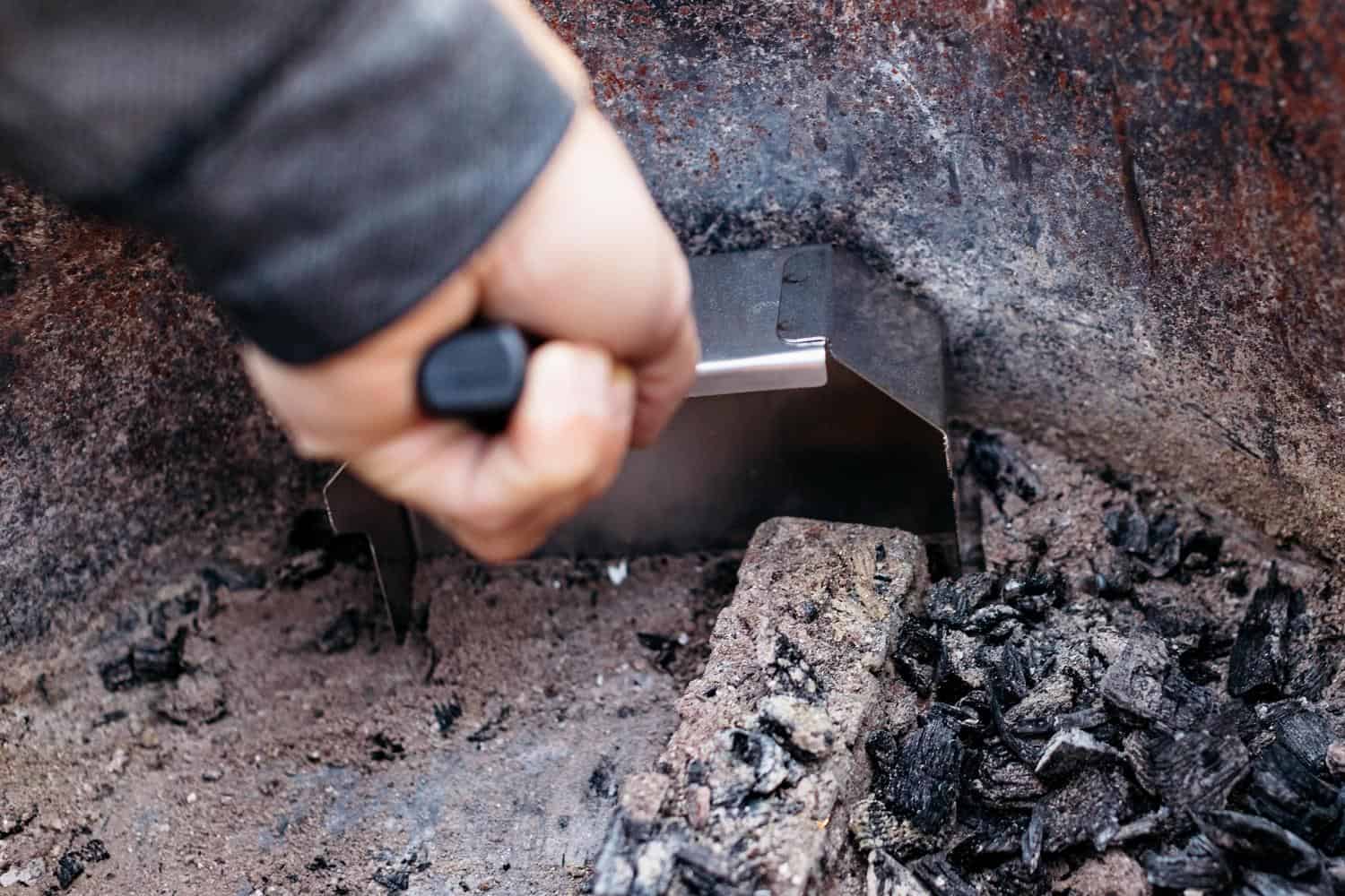 Removing ash with a Breeo Ash Shovel
