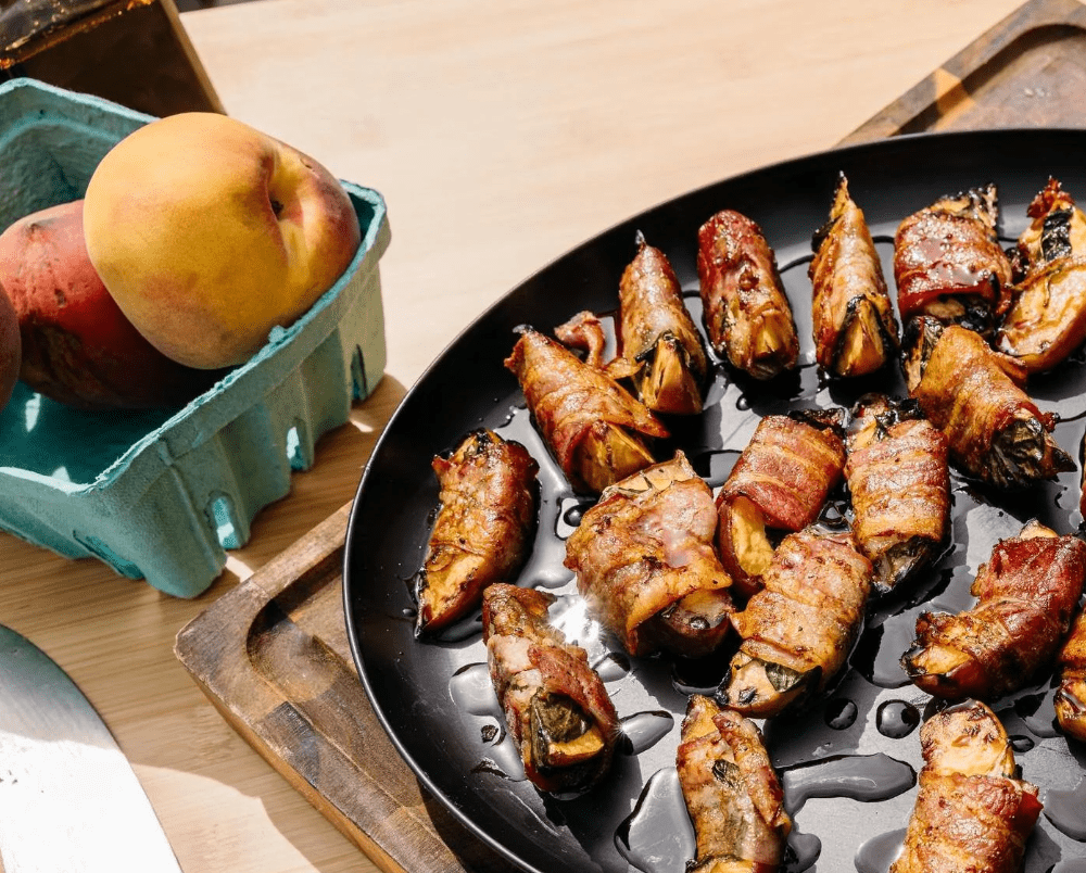Bacon Wrapped Grilled Peaches cooked over the Breeo firepit 