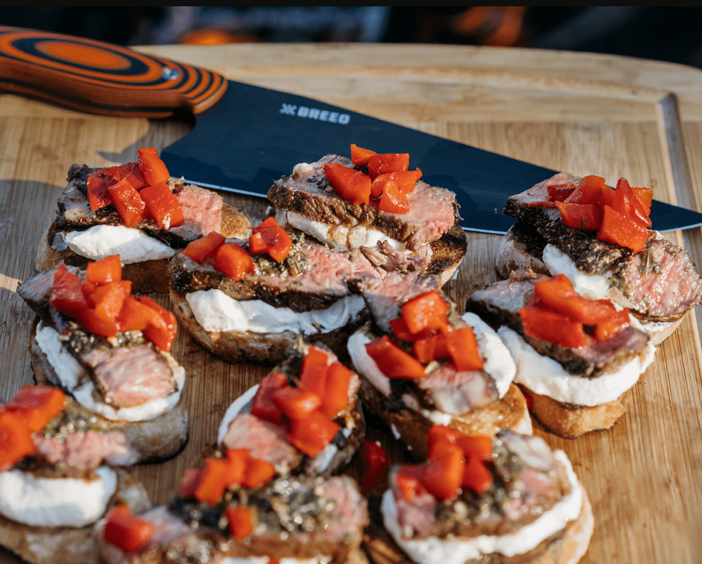 Steak Crostini with Whipped Ricotta and Chimichurri made on the Breeo fire pit