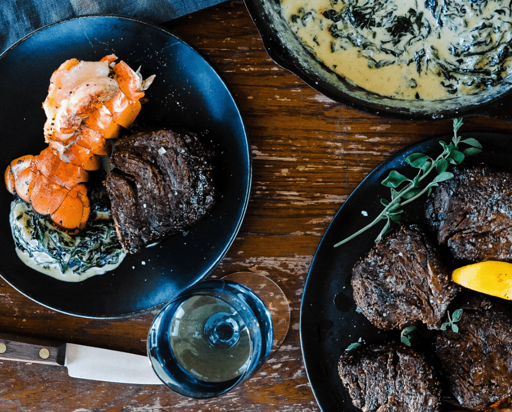 Grilled Steak, Lobster and Creamed Spinach grilled on a Breeo Firepit