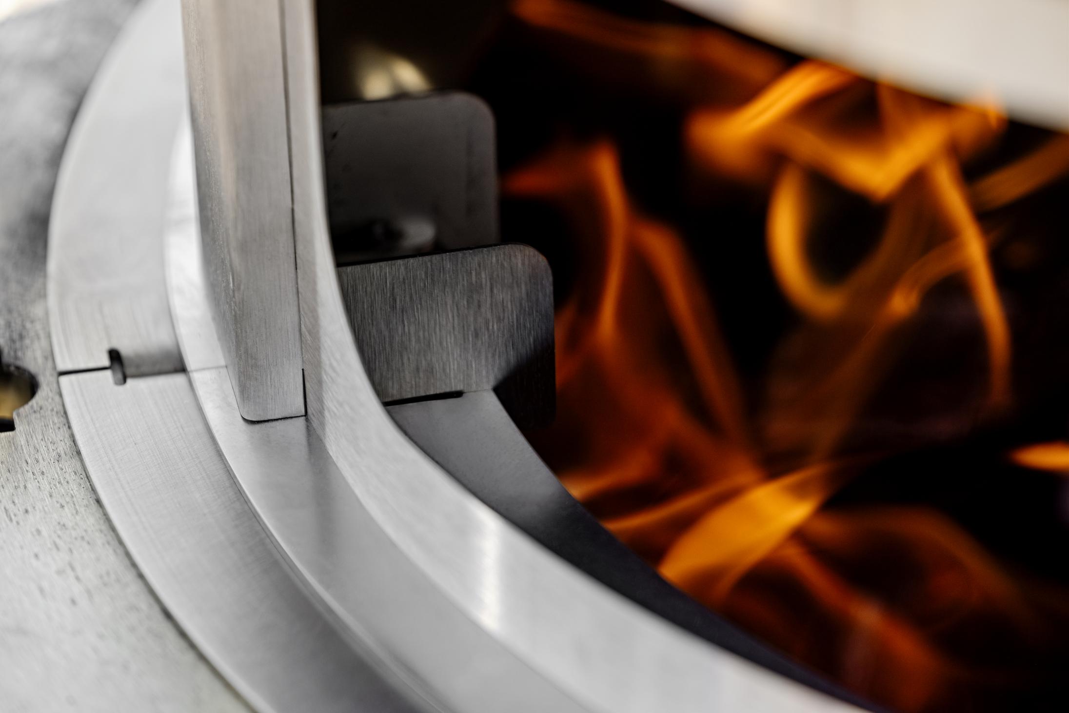 This is an image of the Breeo Pizza Oven Adapter