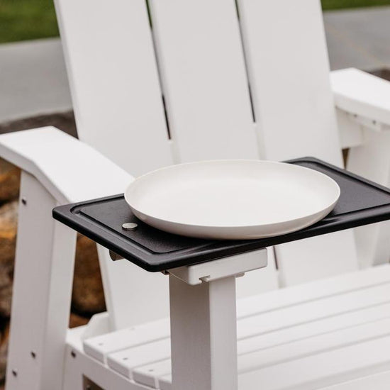 This is an image of the white X Series chair with an Outrig Tray