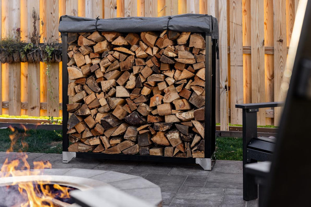 Organize split logs and protect them from winter snow. See why elevated, canopy-covered wood racks reduce STR upkeep costs.