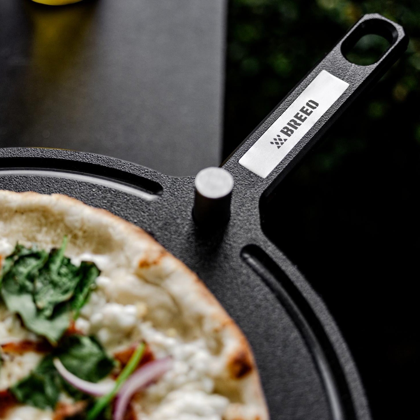 This is an image of the Breeo Serving Board with pizza 